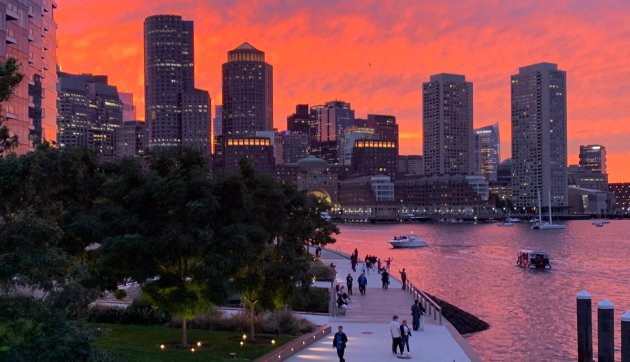 Red sky over downtown Boston and Boston Harbor