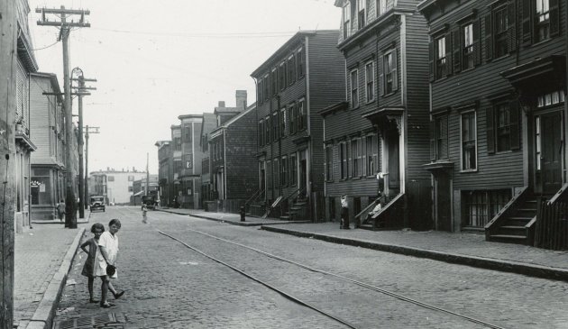Kids on an empty street in old Boston