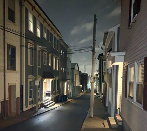 Lights out on a street that looks like a painting