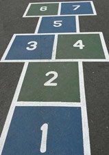 Hopscotch board at Draper Playground in West Roxbury