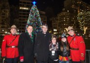 Canadians in front of the Boston Christmas tree, a gift from Nova Scotia