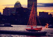 Santa on the Charles River at sunset