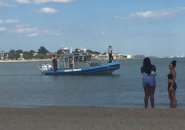Troopers search water off Carson Beach