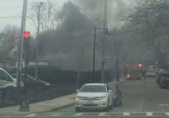 Dump truck on fire in Jackson Square