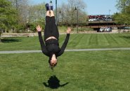 Woman doing a flip in Paul Revere Park in Charlestown