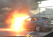 Honda Civic on fire on Frontage Road
