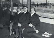 Riders on an old Boston subway train