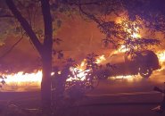 Burning car and street in Roslindale