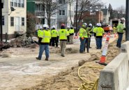 Workers on Hyde Park Avenue at gas-main flame