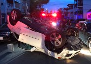 Flipped car in Jamaica Plain