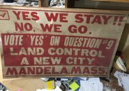 Old sign uring a vote to create the city of Mandela.