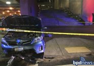 Crashed car at bottom of City Hall steps