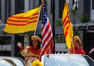 Women with South Vietnamese and American flags