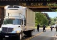 Truck stuck at East Street bridge in Dedham