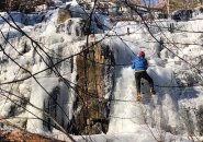 Climbing a still frozen waterfall in Medford