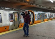 New train, with bonus cameraman, at Forest Hills this morning