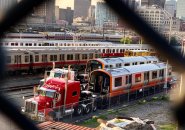 Orange Line cars being dropped off at a Red Line yard