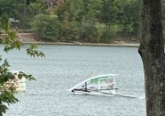 Jamaica Pond sailboat knocked over by the wind