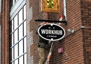 Workhub sign going up