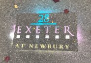 Stenciled ad for 28 Exeter