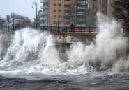 Waves slam into Lynn seawall