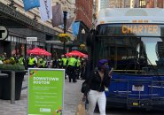 Bus bearing police officers in Downtown Crossing