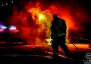 Firefighter at car fire