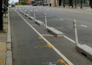 New concrete barriers along bike lane on Massachusetts Avenue