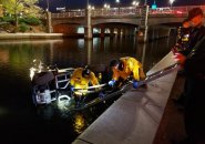 Golf cart being retrieved from Lechmere Canal