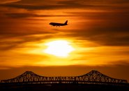 Sunset and jet over the Tobin Bridge