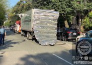 Box truck with peeled-back roof after hitting a bridge on Storrow Drive