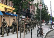 National Guardsmen march past Boston Marathon bombing memorial