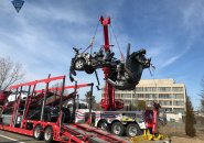 Remains of a vehicle removed from car carrier in Peabody