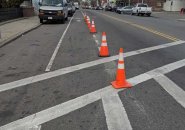 Traffic cones set out by bicyclist to protect bike lane in Dorchester