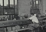 Two guys at a workbench