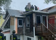 Firefighters at Adams Street fire