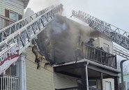 Firefighters at 18 Harvard Ave. in Dorchester