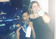 Couple with gun and Belaire champagne