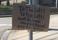 Sign reads: To the left! Use your brane!