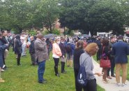 People at vigil for stabbed rabbi