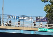9/11 truthers over the Massachusetts Turnpike in Newton