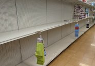 Empty paper-towel and toilet-paper shelves at Dedham Stop and Shop