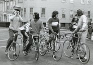 Guys on bikes in old Boston