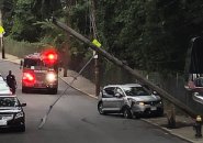 Pole knocked down by car on Rowe Street