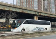 Bus backing up on Soldiers Field Road