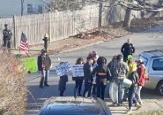 Bucket-drumming brigade outside Ricardo Arroyo's mother's house