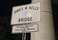 John M. Kelly bridge sign referencing Tom Menino and Deval Patrick