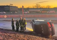 Flipped car on a 128 offramp in Needham