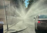 Hydrant opened up on a Boston street