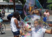 Making bubbles in the centre of Centre Street